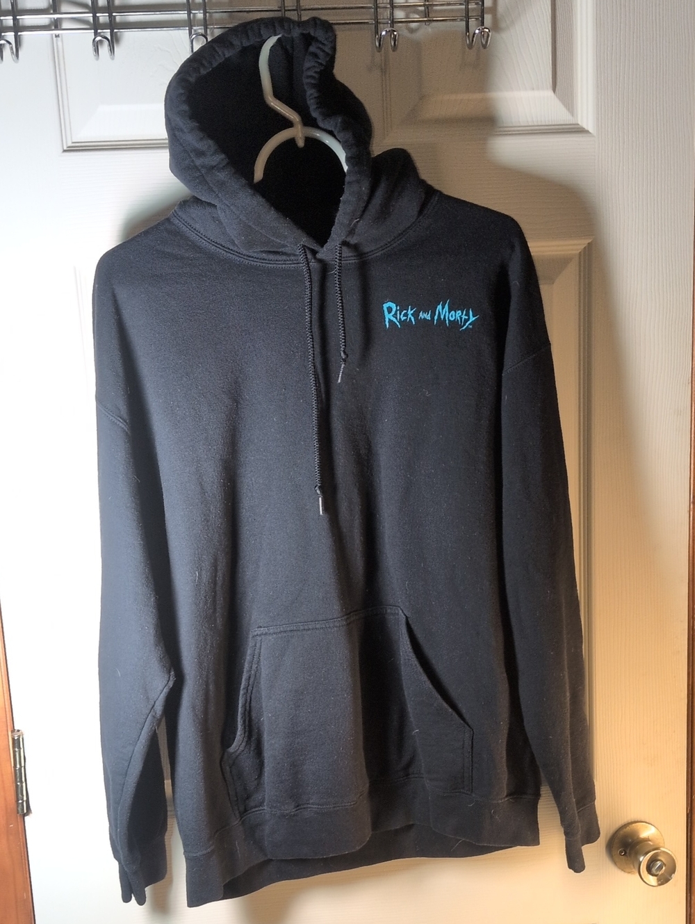 Black Pullover Hoodie with Teal Logo